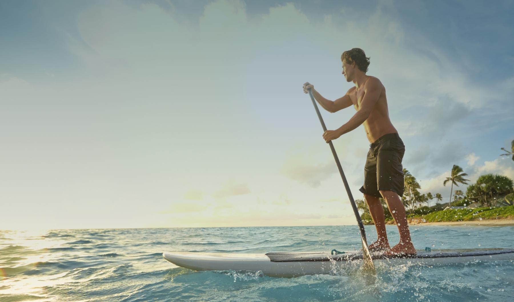 a man on a paddle board