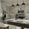 kitchen with grey cabinets and island with seating 