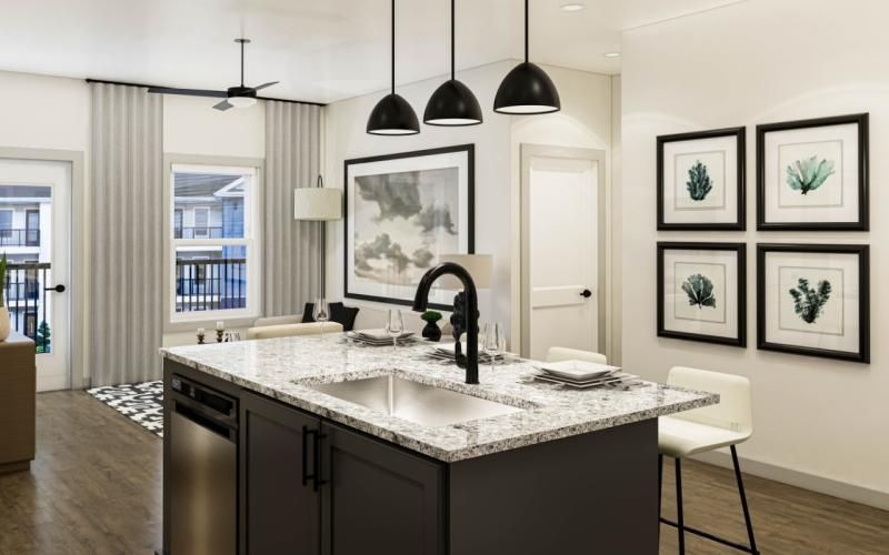 a kitchen with a marble countertop